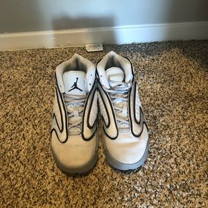 grey , white , and black woman’s jordan’s